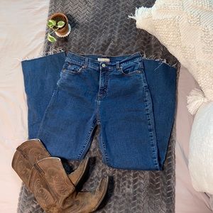 levi boot cut jeans with raw hem.